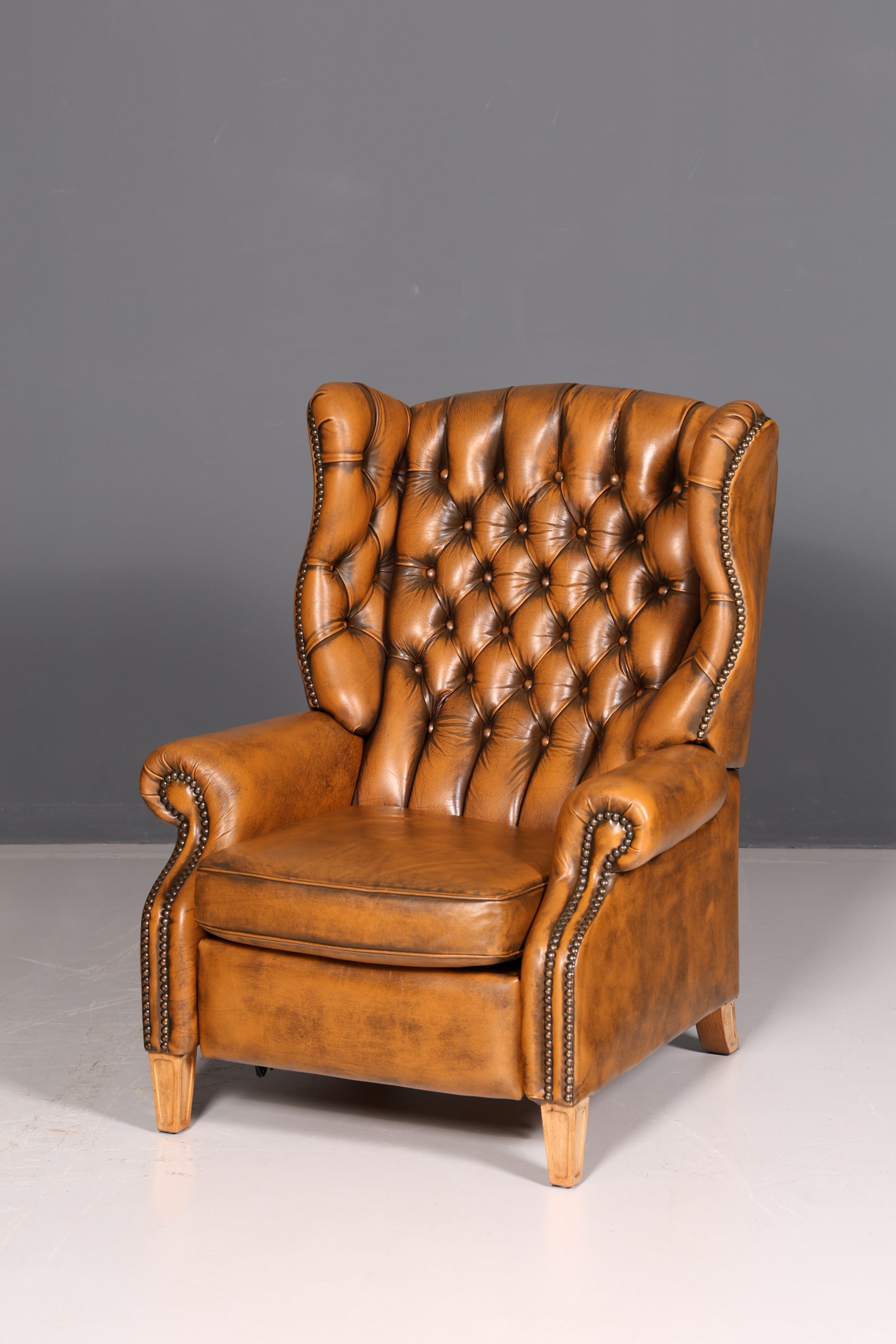 Original Chesterfield wingback armchair, genuine leather, English gentleman’s chair, leather armchair, soft leather, reclining function, antique vintage