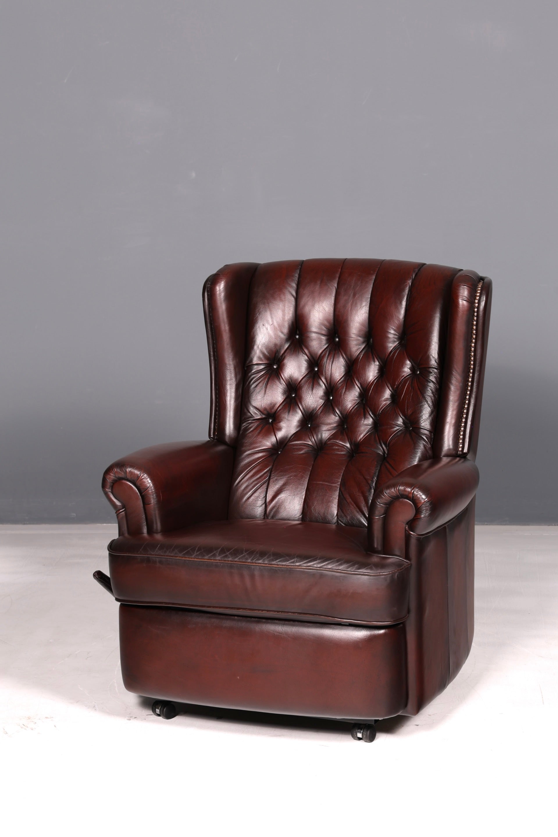 Elegant Chesterfield wingback armchair, recliner, genuine brown leather, TV chair, lounge chair, leather armchair