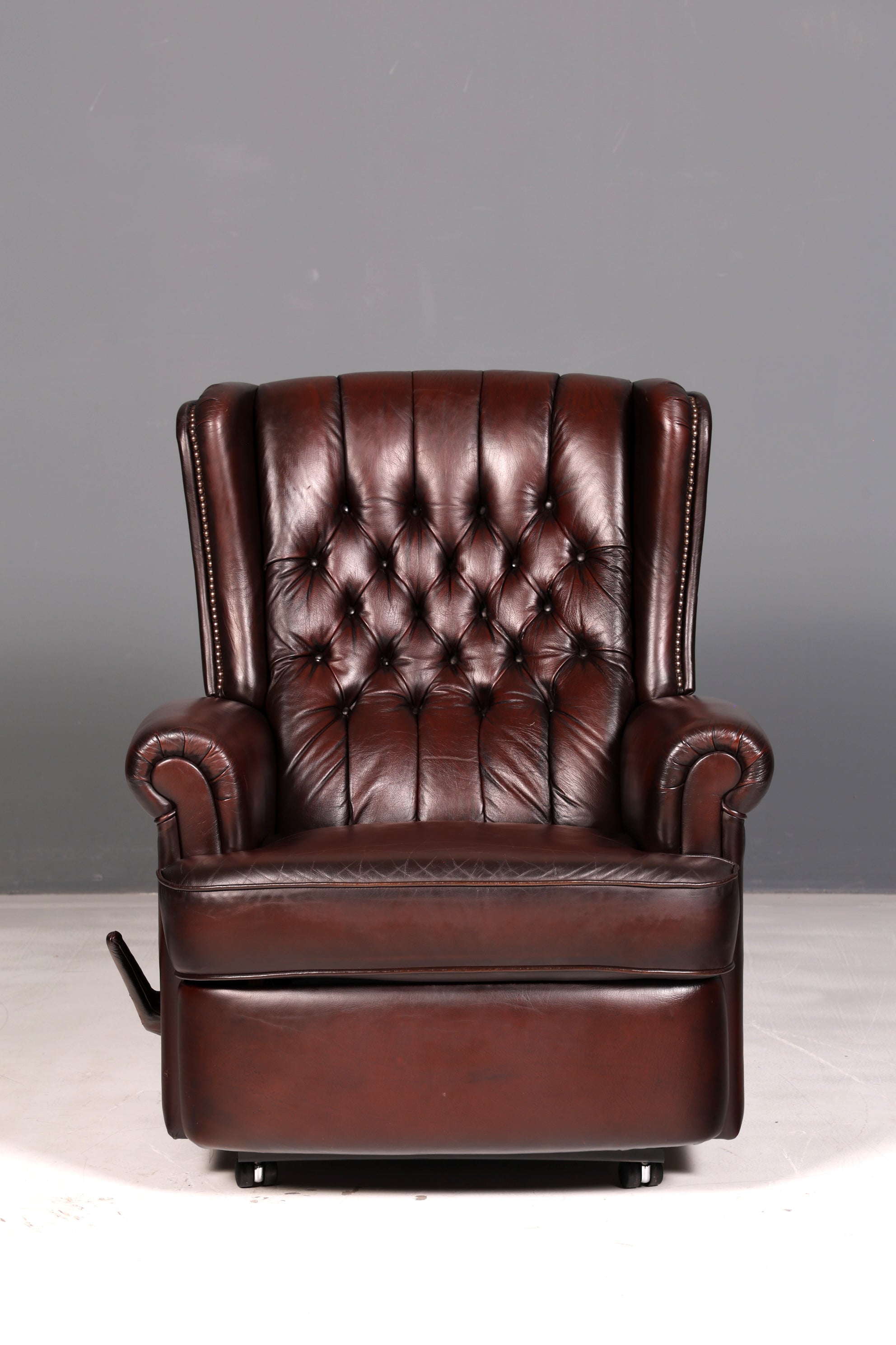 Elegant Chesterfield wingback armchair, recliner, genuine brown leather, TV chair, lounge chair, leather armchair