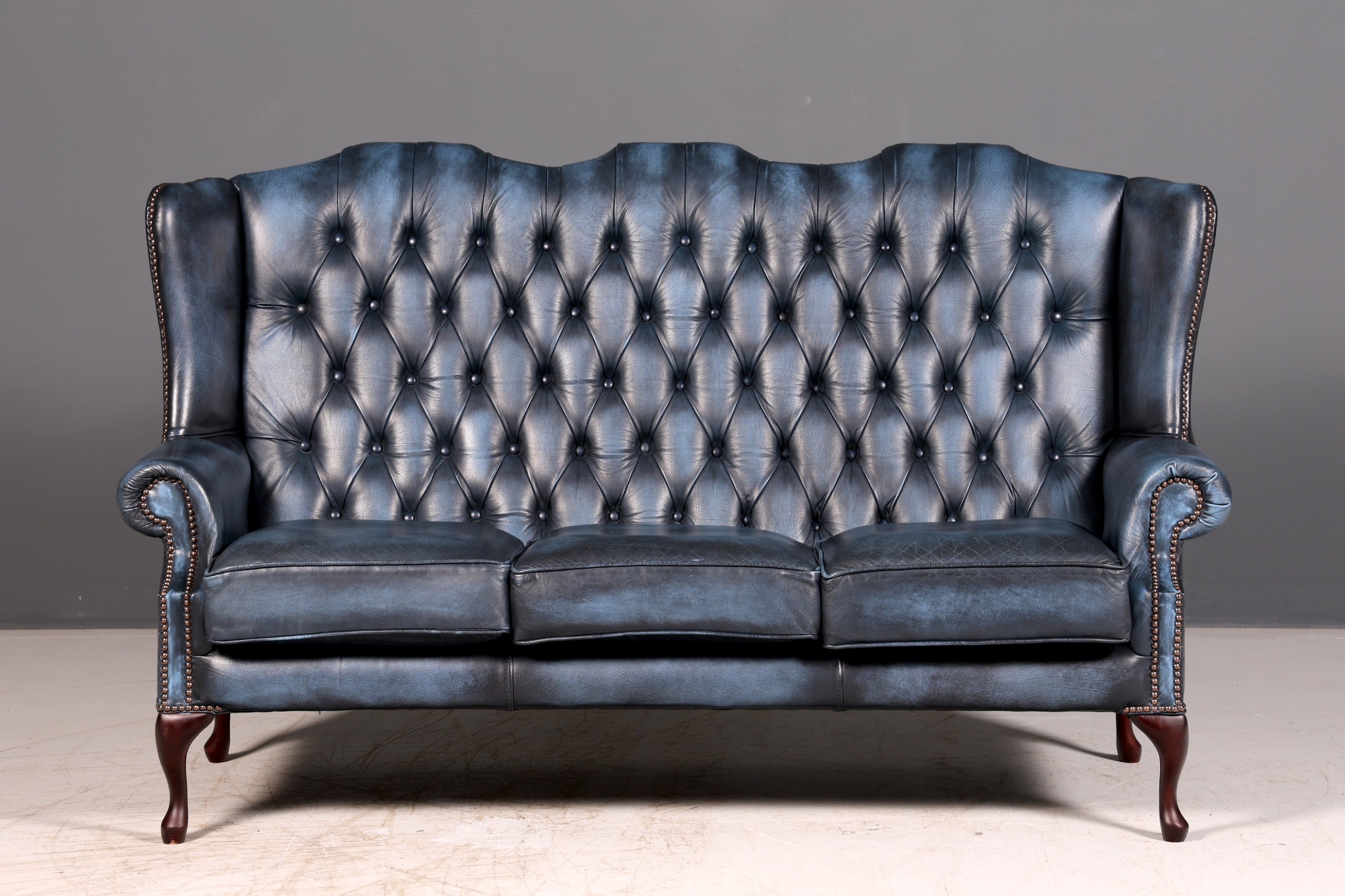 Beautiful original Chesterfield three-seater sofa, Queen Anne, blue English leather couch, England upholstered sofa