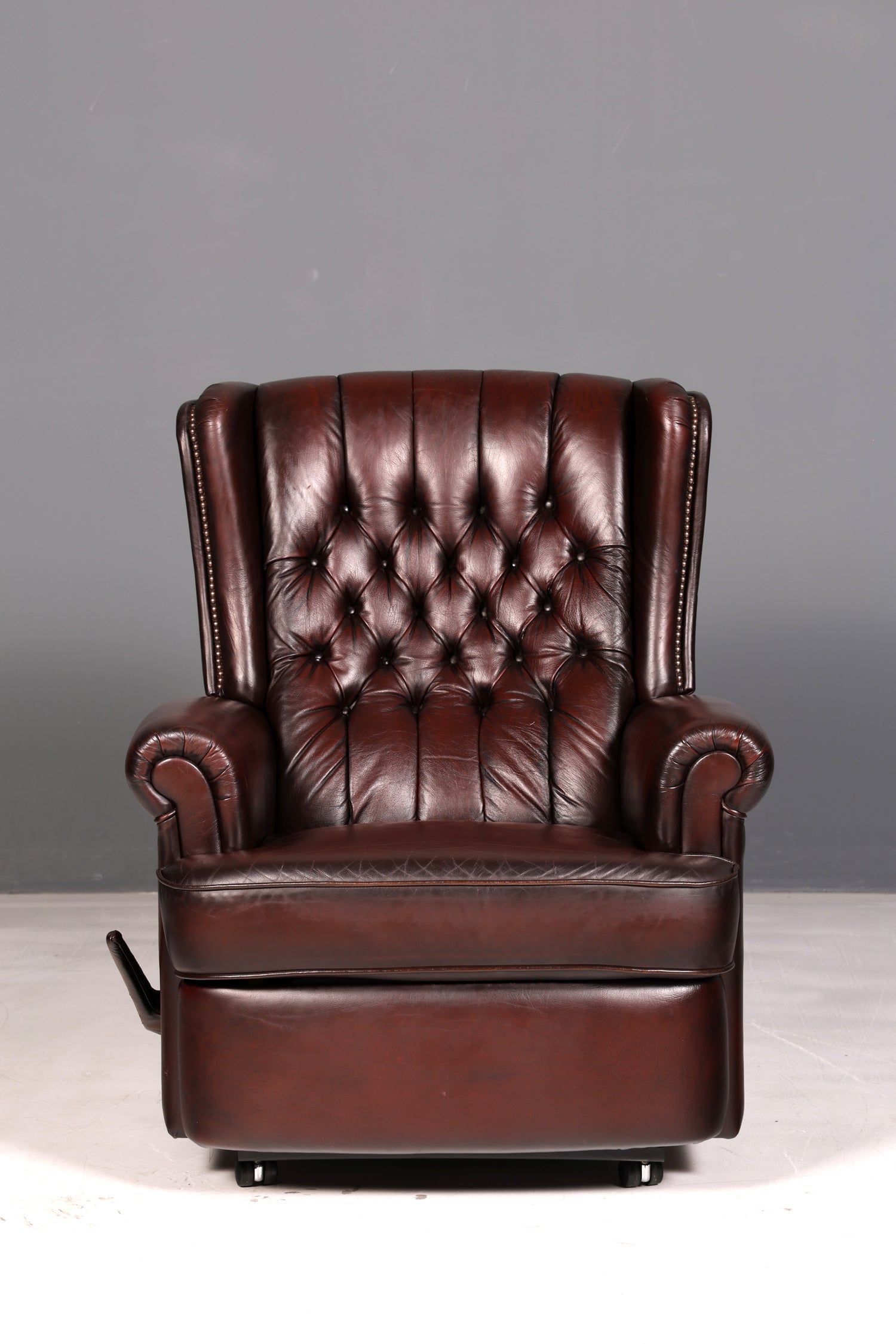 Elegant Chesterfield wingback armchair, recliner, genuine brown leather, TV chair, lounge chair, leather armchair