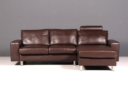 Beautiful Stressless E200 corner sofa in genuine brown leather with chaise longue, footstool, and vintage leather upholstery.
